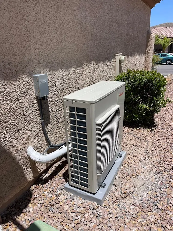 Residential air conditioning condenser unit in Stillwater